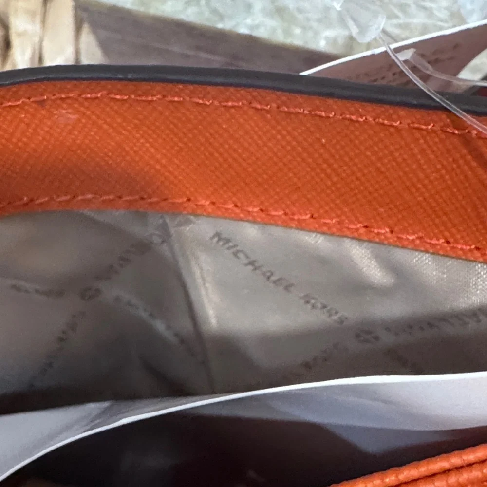 NWT Michael Kors Orange Jet Set Large Travel Wallet Wristlet